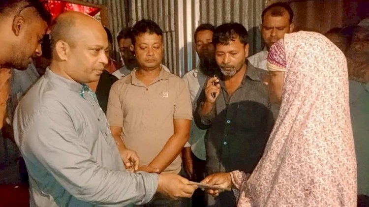 Kazi Rahman Manik stands by the family of the van driver leader.