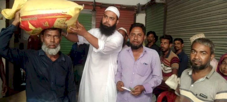 Rice distribution at Fair Price in Galachipa ensures transparency and accurate weight.